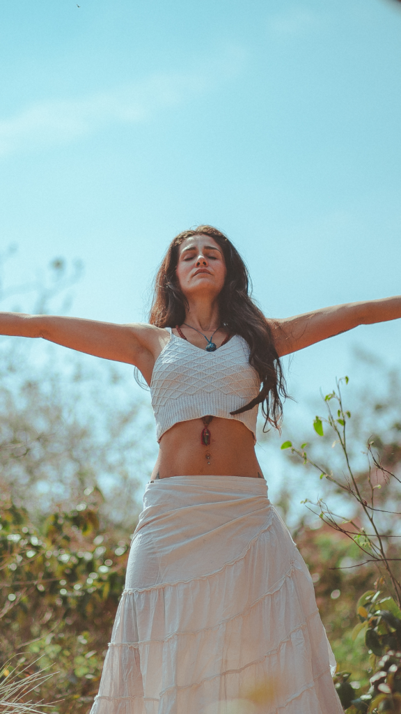 What do longevity doctors do? woman perfomring yoga in an garden